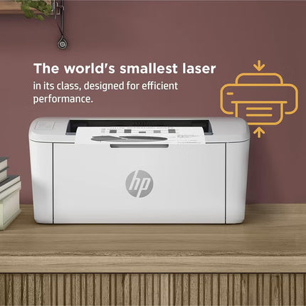 HP laser printer on a wooden surface with a brown wall background