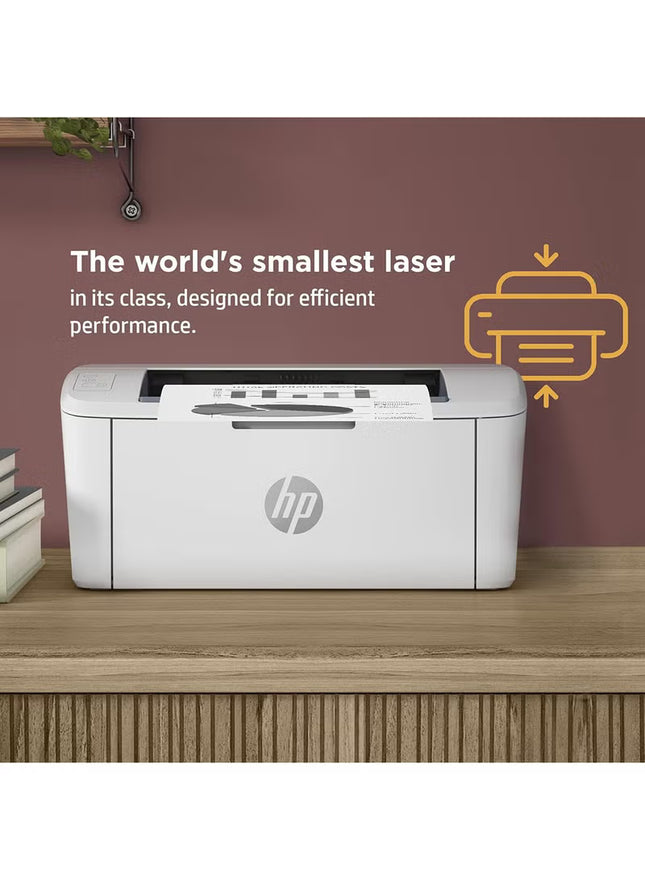 HP laser printer on a wooden surface with a brown wall background